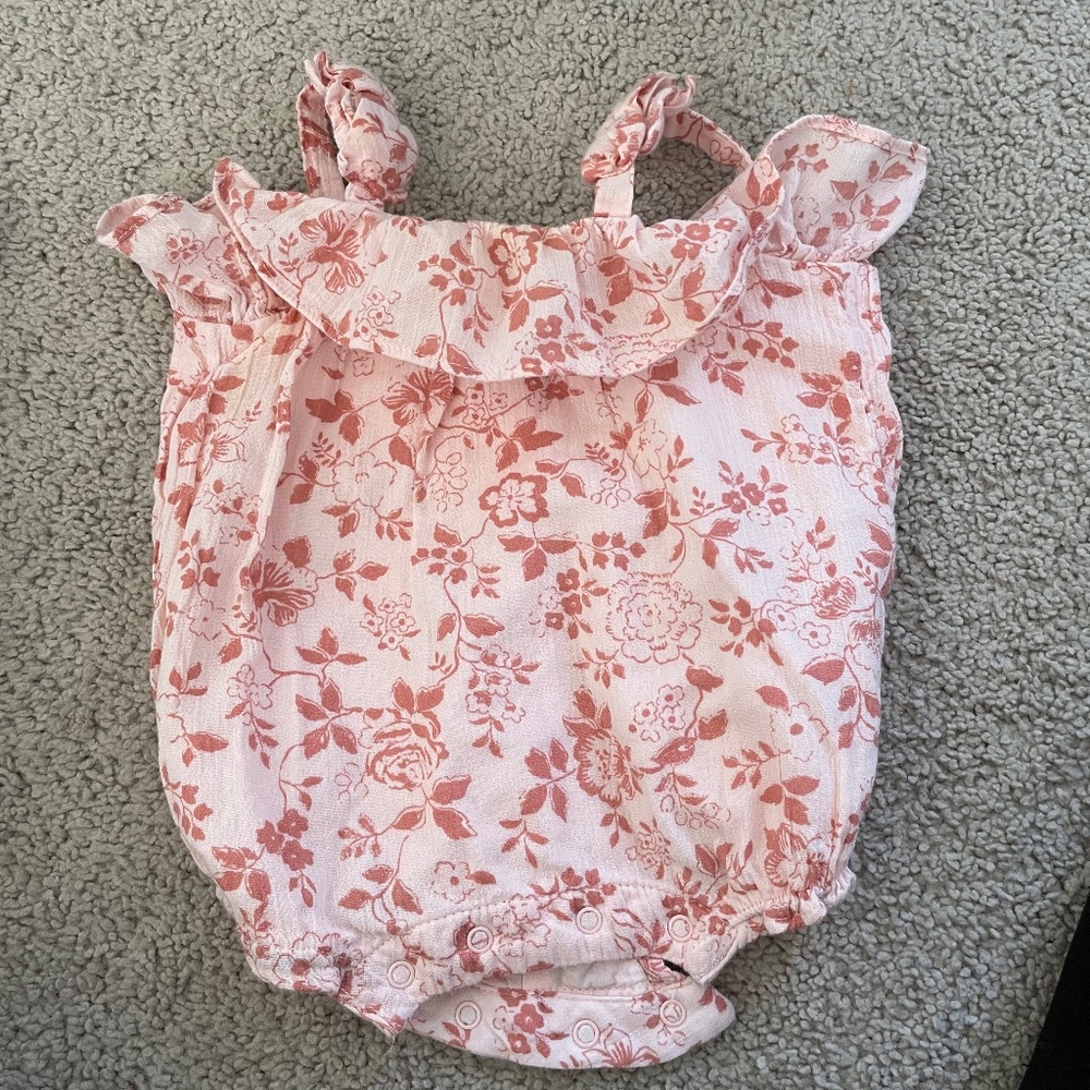 Beautiful light pink floral body suit